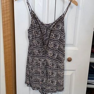 Cute romper with open back/ size small, runs big
